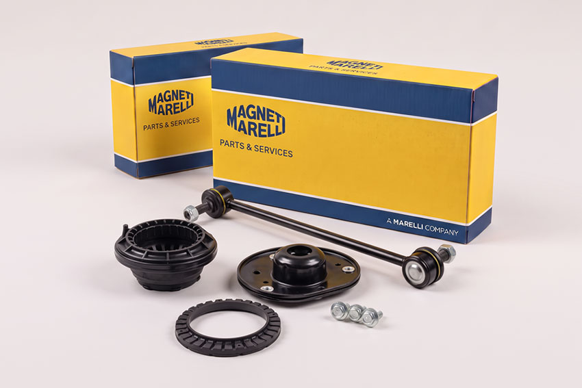 Scatole di imballaggio Magneti Marelli Parts & Services e componenti della gamma kit accessori per ammortizzatori e biellette della barra stabilizzatrice